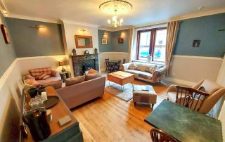 Shared lounge at Amble Harbour Retreats