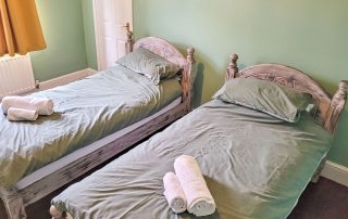 Twin room at Amble Harbour Retreats